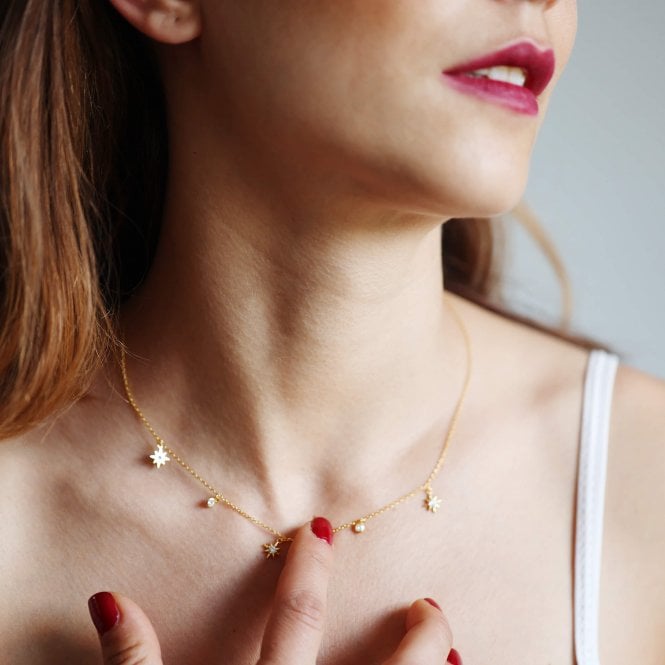 Simple gold ruby on sale necklace